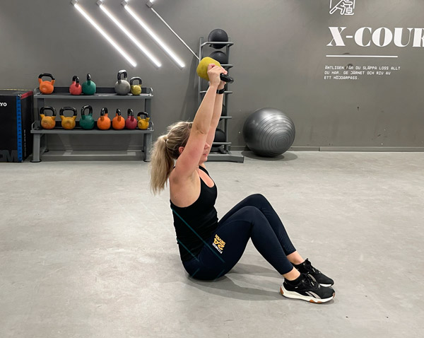sit ups med armsträck