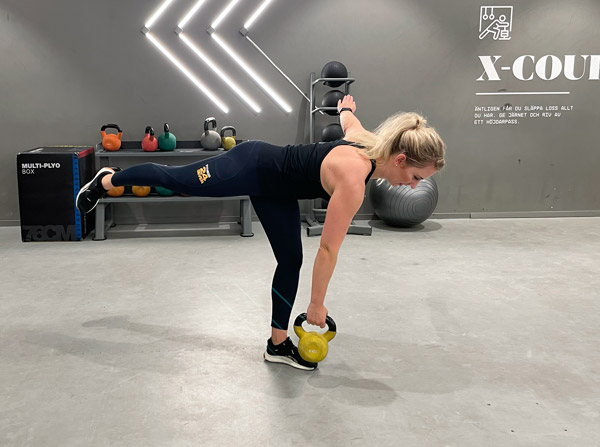 En övning som kallas draken med kettlebell